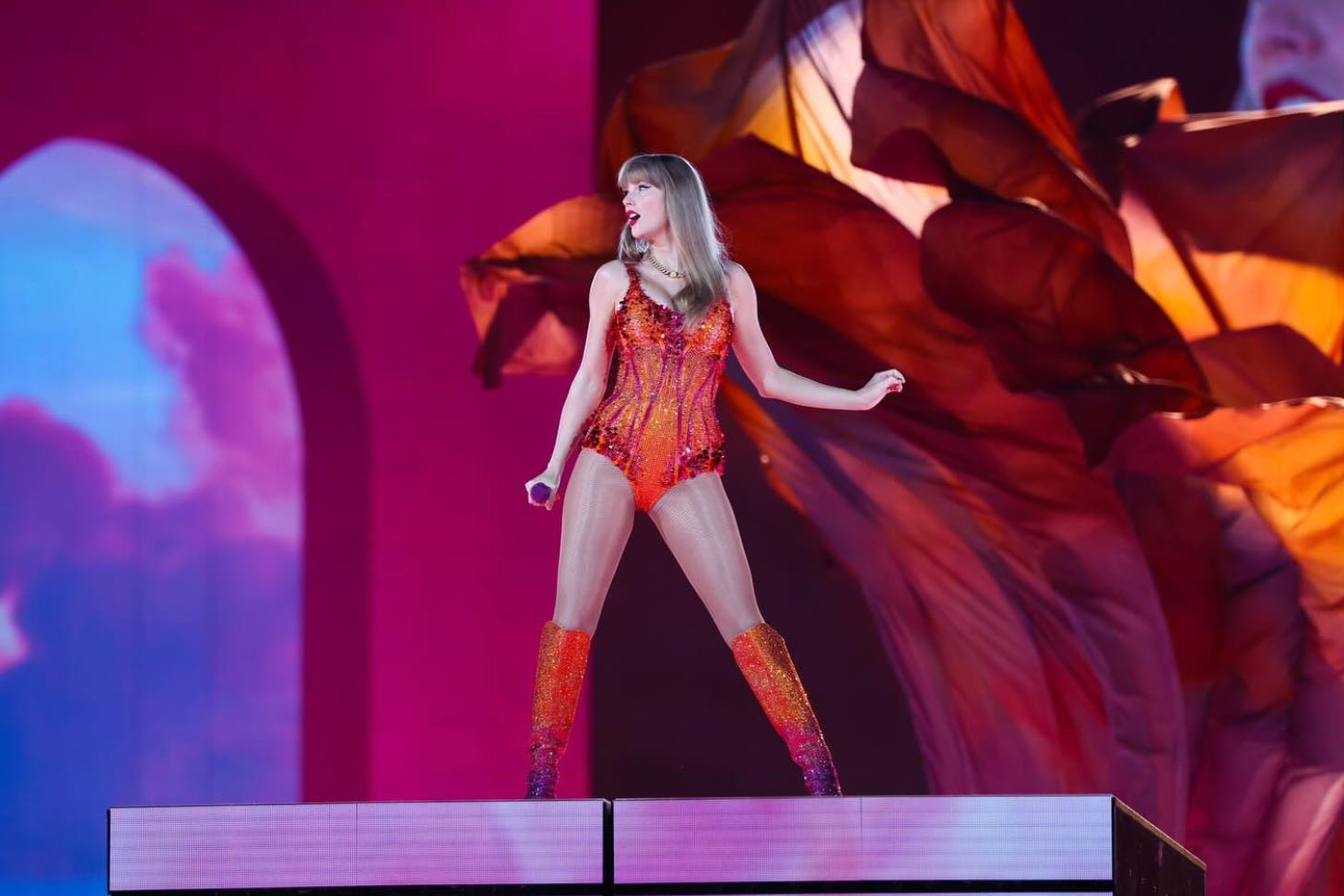 taylor swift orange bodysuit at eras tour